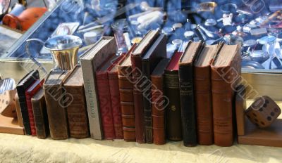 Piles of old books for sale