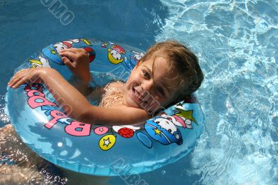 Girl in a swimming-pool