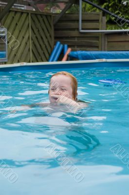 girl playing in the water