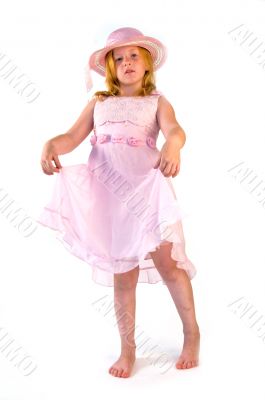 girl standing in pink dress