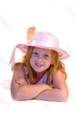 young girl laying with head on