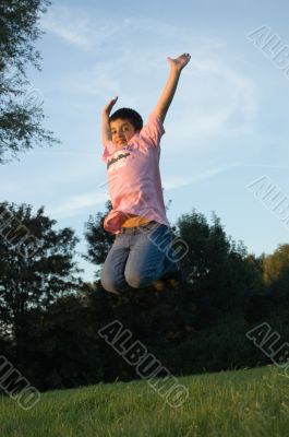 boy cheerfull jumping boy cheerfull jumping