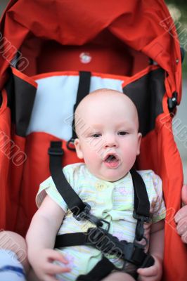 Baby in sitting stroller #2