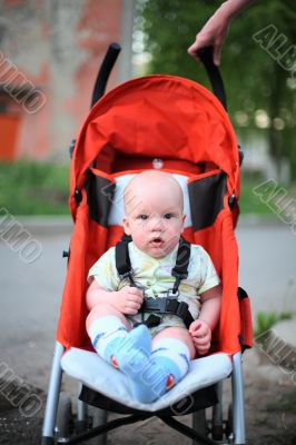 Baby in sitting stroller #5