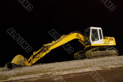 excavator on night pebble beach mounting tube excavator on night pebble beach mounting tube