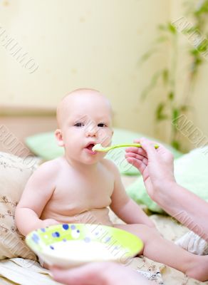 Mother feed baby by porridge #2