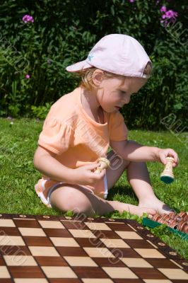 Girl playing chess