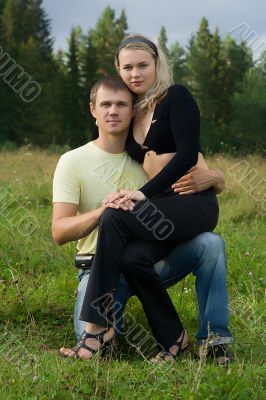 Young man and the woman on the nature