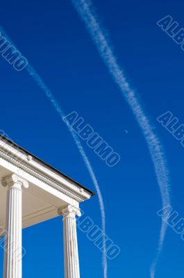 white columns over blue sky background