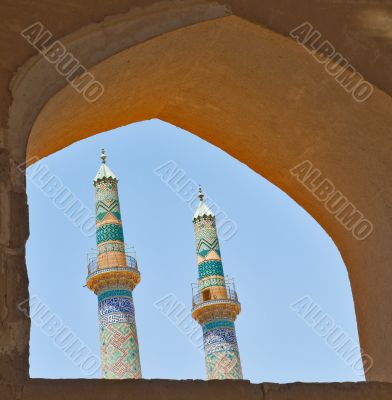 two minarets in an ancient city of Yazd, Iran
