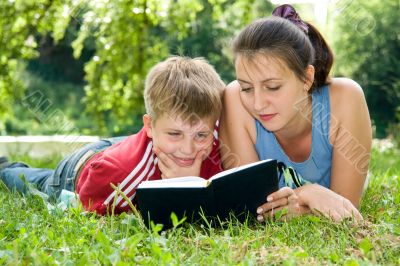 Mum and the son reads