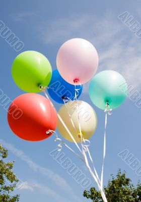 varicoloured balloons on background sky