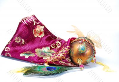 Decorated egg peacock feather and bag