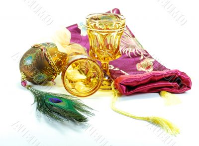 Decorated egg peacock feather drinking glasses and bag