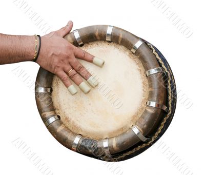 hand hitting Indian drum