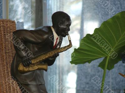 The musician the saxophonist a playing jazz