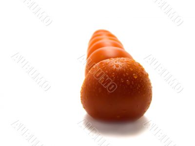 Red tasty isolated tomatoes Red tasty isolated tomatoes