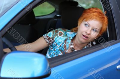 Young woman in a car Young woman in a car