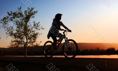 Woman riding her bike