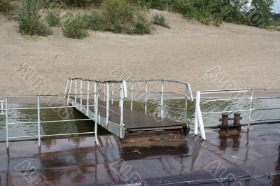 Pier in the Ob`, the island 1