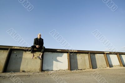 Punk Businessman on a Wall