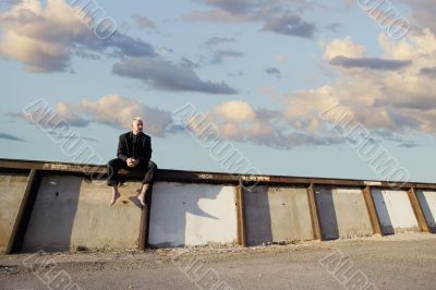 Punk Businessman on a Wall