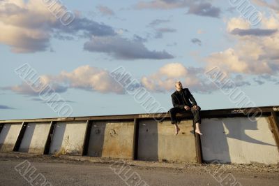 Punk Businessman on a Wall