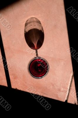 Wine Glass with Dramatic Shadow