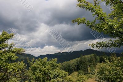 Rainy clouds in mountains