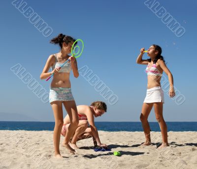 Girls playing on the beach