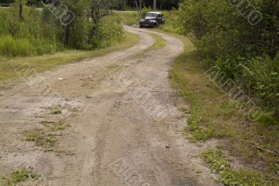 car on dirt road