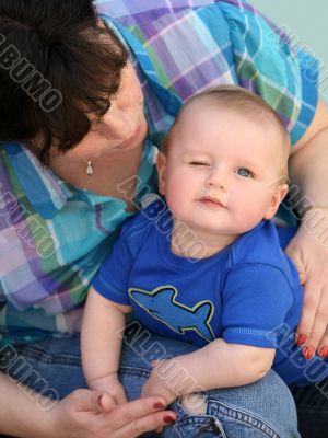Mother playing with her baby