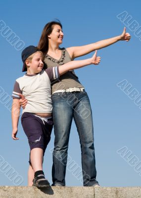 Family with thumb up