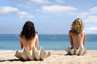 Two girls in sea shells