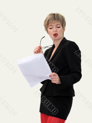 Businesswoman reading a paper