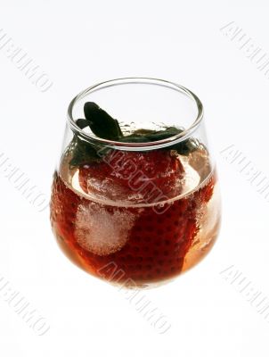 Strawberry in glass and ice