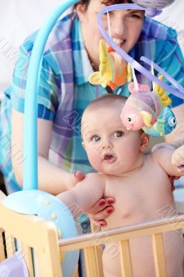 Mother playing with her baby