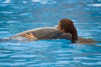 Woman hugs the dolphin Woman hugs the dolphin