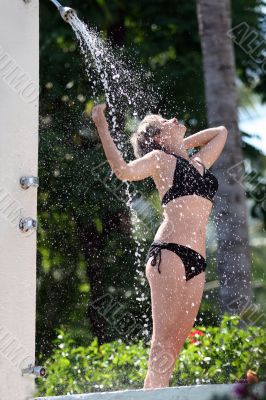 Woman in the outdoor shower