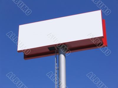 Blank billboard over blue sky