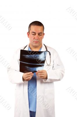 Male doctor examining x-ray