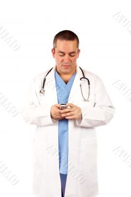 Male doctor sending sms