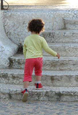 the child rising on steps