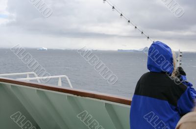 Cruise ship tourist in blue parka