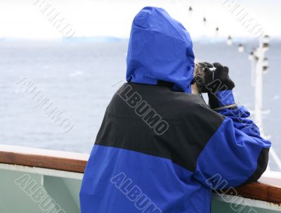 Cruise ship tourist in blue parka