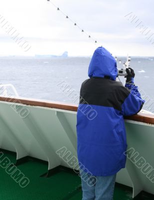 Cruise ship tourist in blue parka