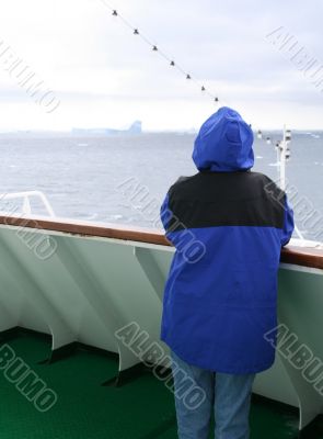 Cruise ship tourist in blue parka