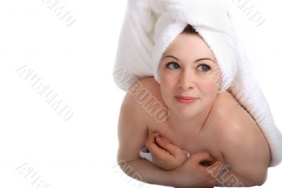 Laying girl in towel