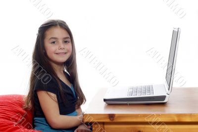 Young girl in front of a laptop Young girl in front of a laptop