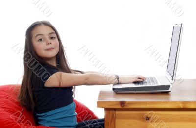 Young girl in front of a laptop Young girl in front of a laptop